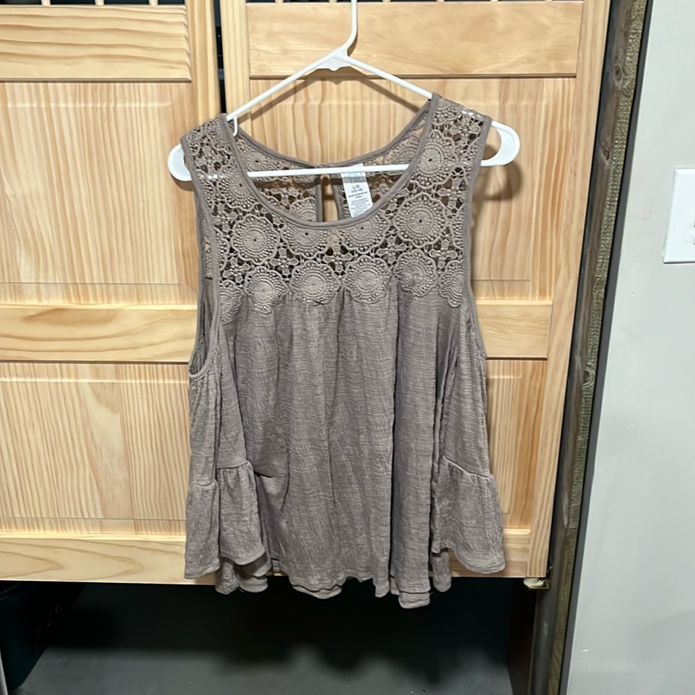 Cold shoulder top. Taupe in color. Size large worn one time.